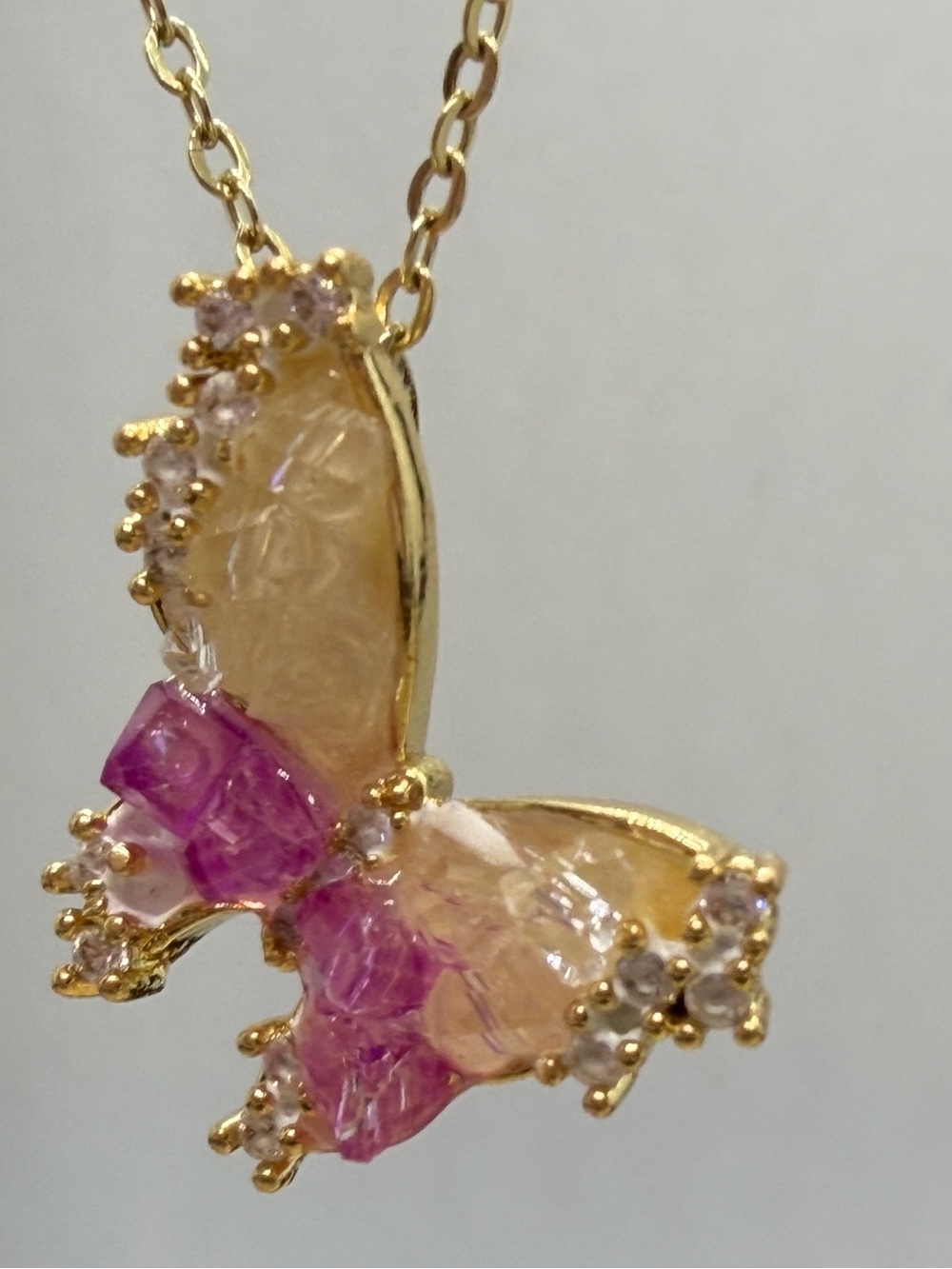 Gold Butterfly Pendant Necklace with Pink and Champagne Stones